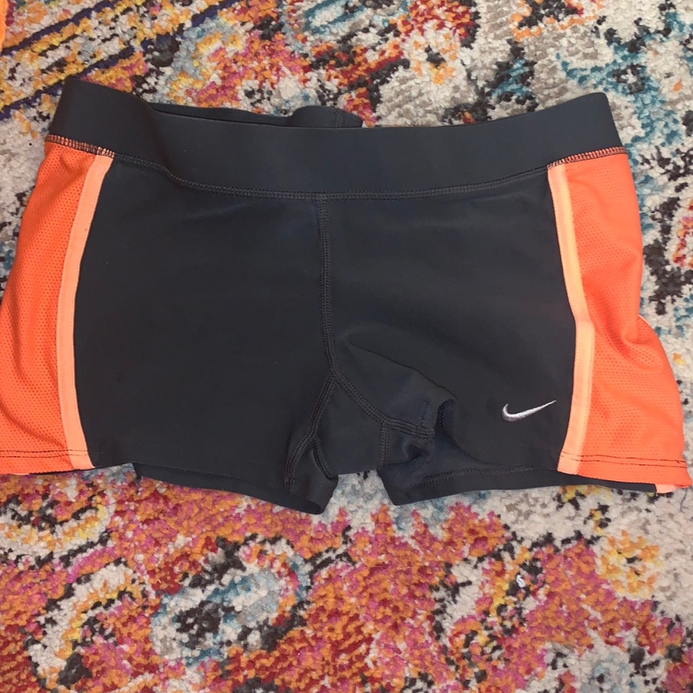 Gray Nike booty shorts, peach and orange sides
